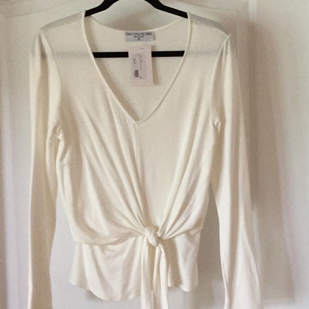 NWT a beautiful ivory boutique blouse!